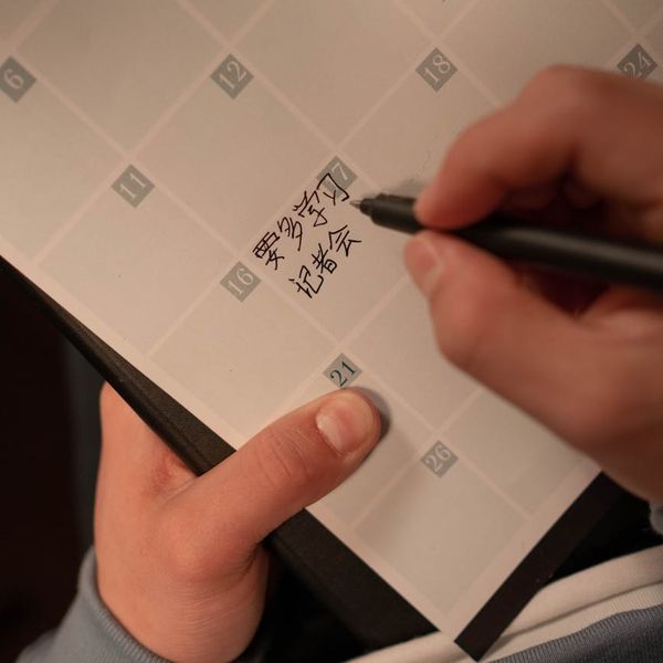 Calendar with several days marked, symbolizing a consistent routine.